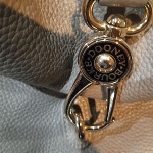 Light grey dooney hobo medium back with bag